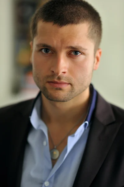 Male actor head shot showing action movie character — Stock Photo, Image