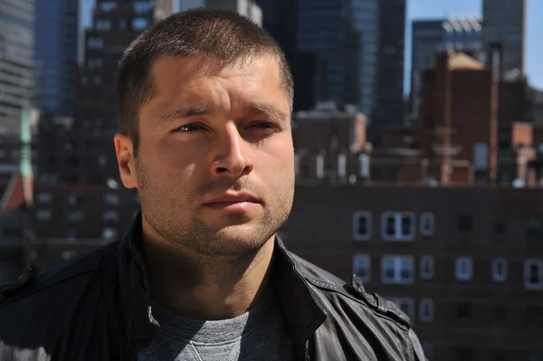 Male actor head shot showing action movie character — Stock Photo, Image