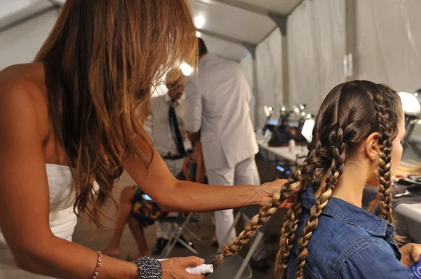 Model getting ready for the show at the Agua Di Lara 2014 Collection backstage during Mercedes-Benz Swim Fashion Week — Stock Photo, Image