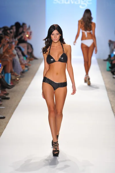 Model walks runway at the Sauvage Collection for Spring Summer 2014 during Mercedes-Benz Swim Fashion Week — Stock Photo, Image