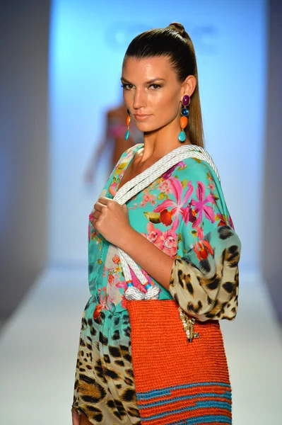 A model walks the runway at the Caffe Swimwear show — Stock Photo, Image