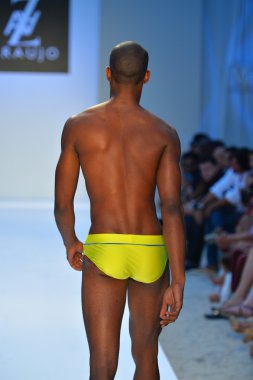 A model walks the runway at the A.Z. Araujo show clipart