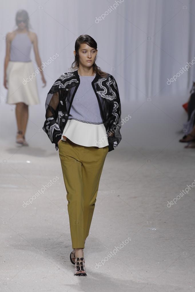 NEW YORK, NY - SEPTEMBER 09: A model walks the runway at the 3.1 Phillip Lim show during Spring 2014 Mercedes-Benz Fashion Week on September 9, 2013 in New York City.