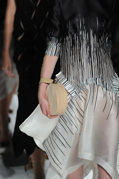 Close-up model's clutch at Zimmermann show — Stock Photo, Image