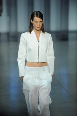 Model walks at Helmut Lang fashion show clipart