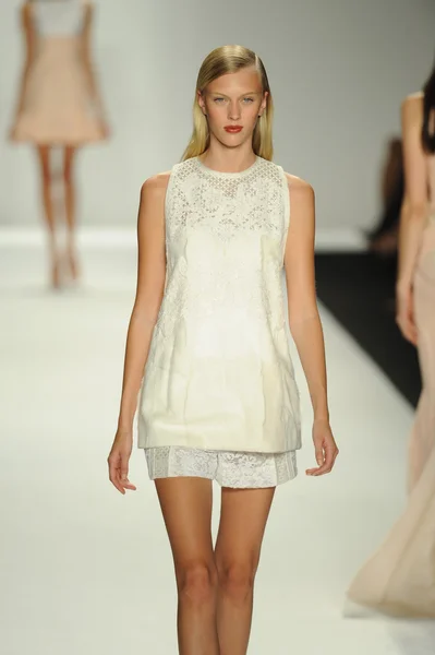 Model walks runway at J. Mendel show — Stock Photo, Image