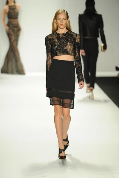 Model walks runway at J. Mendel show — Stock Photo, Image