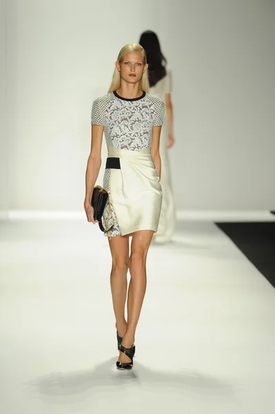 Model walks runway at J. Mendel show Stock Photo