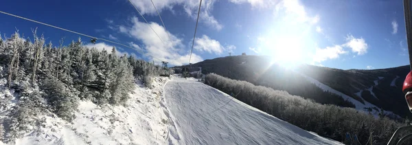 Panoramic view to ski slopes — Stock Photo, Image