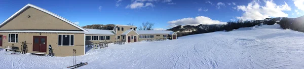 Panoramic view to lodge and ski slopes — Stock Photo, Image