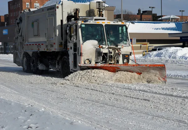 Sanitation tracks cleaning streets — Stock Photo, Image