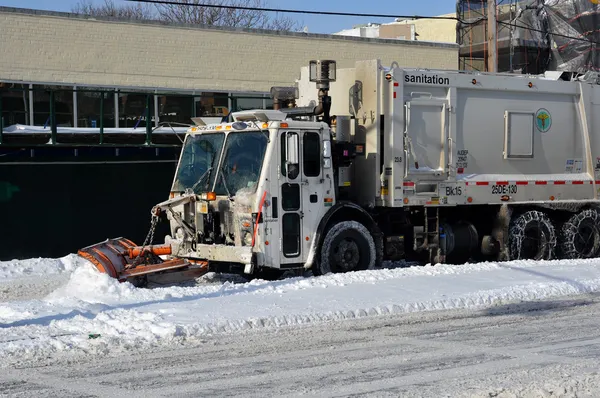 Sanitation tracks cleaning streets — Stock Photo, Image