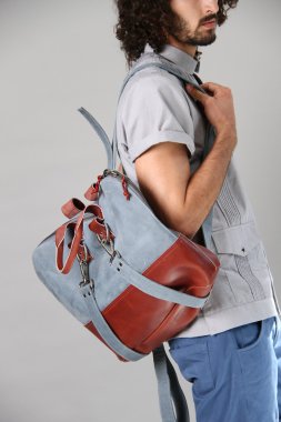 Model present bag at Sergio Davila clipart