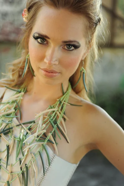 Woman with green bamboo necklace — Stock Photo, Image