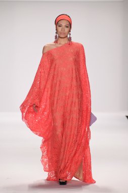 Model walks runway wearing Giada Curti