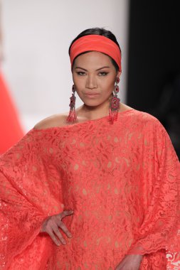 Model walks runway wearing Giada Curti