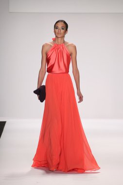 Model walks runway wearing Giada Curti