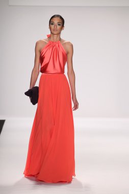 Model walks runway wearing Giada Curti