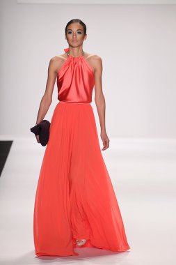 Model walks runway wearing Giada Curti