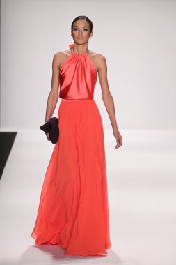 Model walks runway wearing Giada Curti