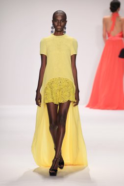 Model walks runway wearing Giada Curti