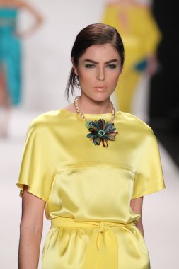 Model walks runway wearing Giada Curti