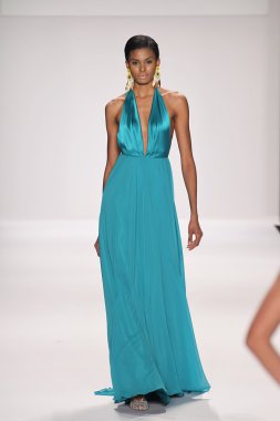 Model walks runway wearing Giada Curti
