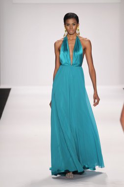 Model walks runway wearing Giada Curti