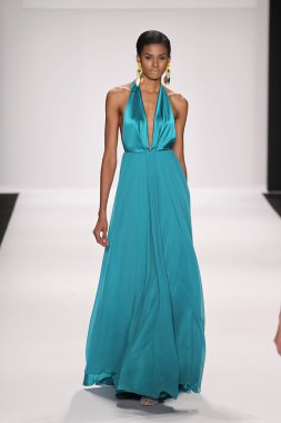 Model walks runway wearing Giada Curti