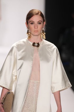 Model walks runway wearing Giada Curti