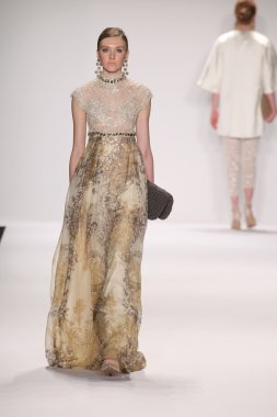 Model walks runway wearing Giada Curti