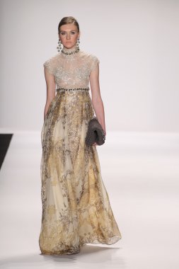 Model walks runway wearing Giada Curti