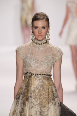 Model walks runway wearing Giada Curti