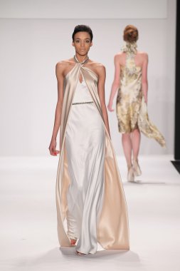 Model walks runway wearing Giada Curti
