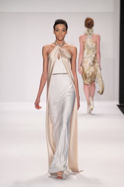 Model walks runway wearing Giada Curti