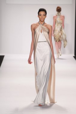 Model walks runway wearing Giada Curti