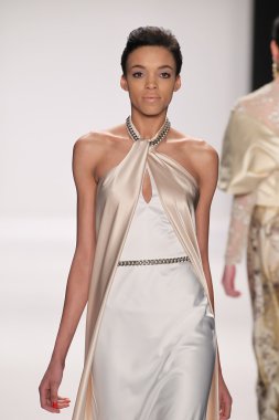 Model walks runway wearing Giada Curti