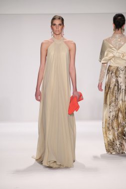 Model walks runway wearing Giada Curti