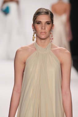 Model walks runway wearing Giada Curti