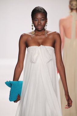 Model walks runway wearing Giada Curti