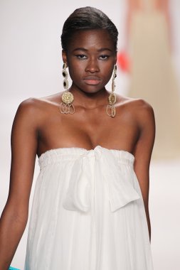 Model walks runway wearing Giada Curti