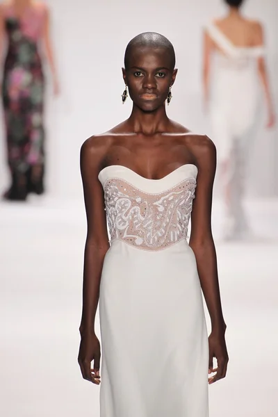 Model walks runway wearing Jamal Taslaq — Stock Photo, Image