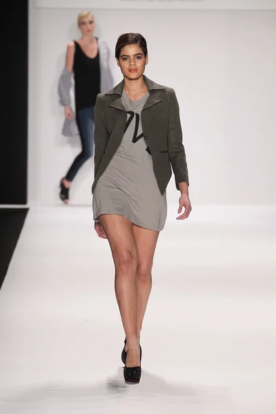 Model walks runway wearing M The Movement — Stock Photo, Image