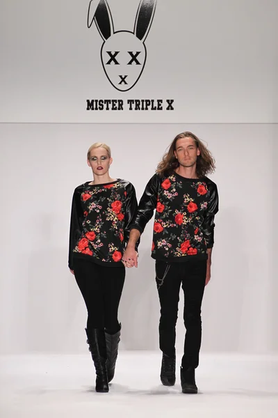 Model walks the runway wearing Mister Triple X — Stock Photo, Image