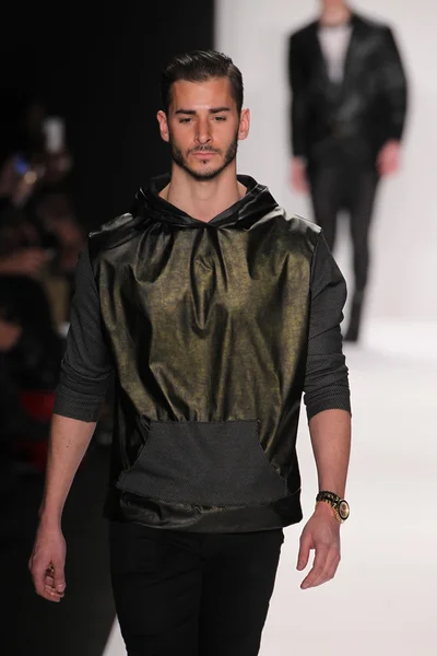 Model walks the runway wearing Mister Triple X — Stock Photo, Image