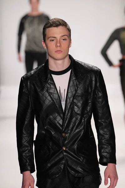 Model walks the runway wearing Mister Triple X — Stock Photo, Image