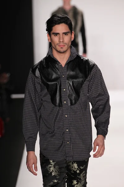 Model walks the runway wearing Mister Triple X — Stock Photo, Image