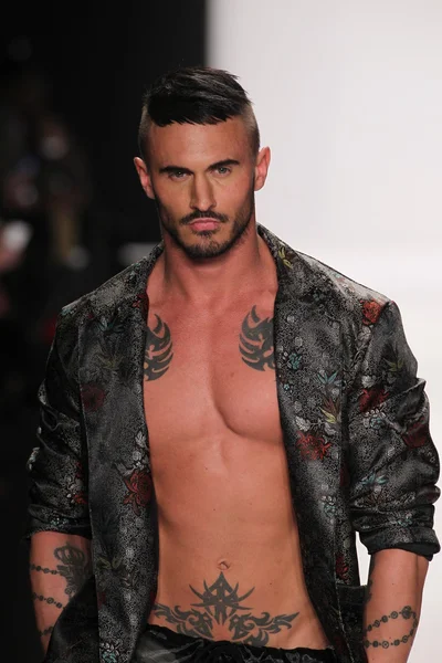 Model walks the runway wearing Mister Triple X — Stock Photo, Image