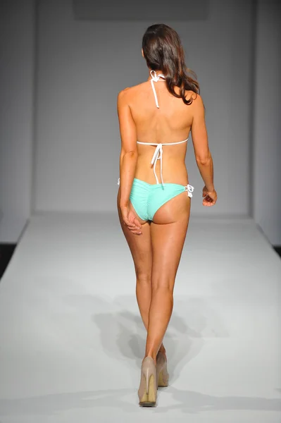 Model at Skinny Bikini swimsuit show — Stock Photo, Image
