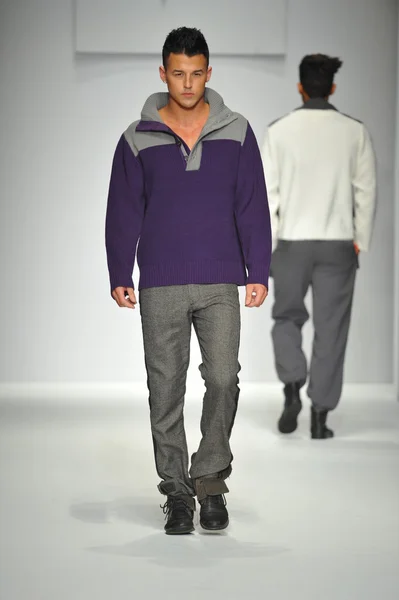 Model walks runway at Consort 62 — Stock Photo, Image